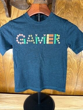 🎉 Nintendo Graphic Tee with Colorful Game Piece Logo. D335